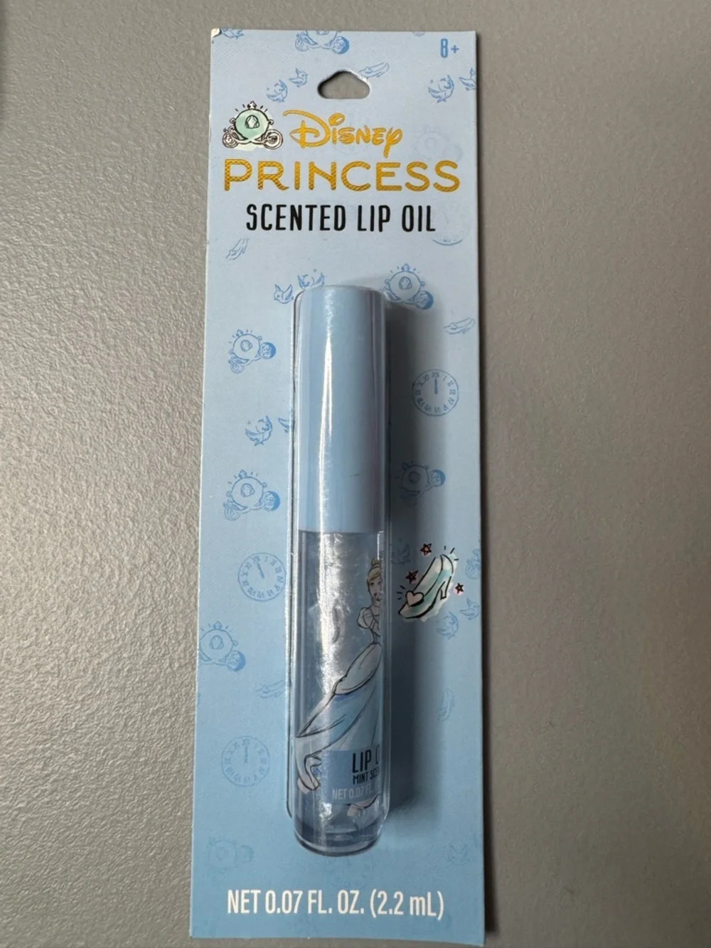 Disney Princess Cinderella themed Scented Lip Oil pastel blue glass shoe carriag